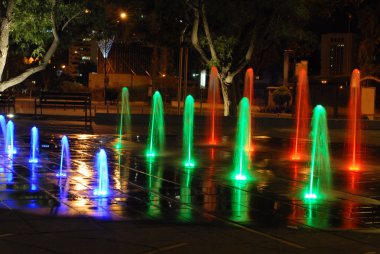 Color fountain in night city clipart