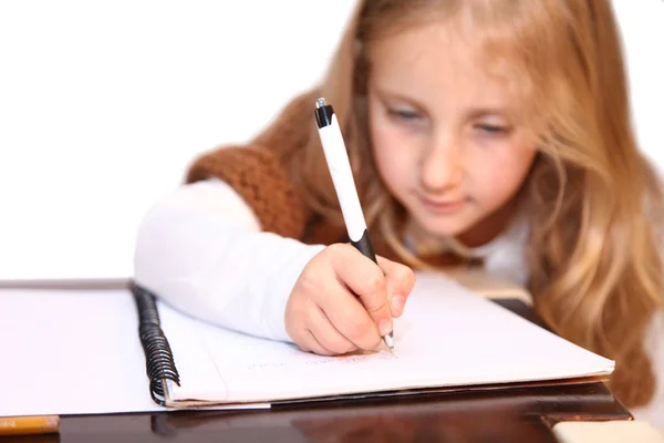 Girl makes lessons — Stock Photo, Image