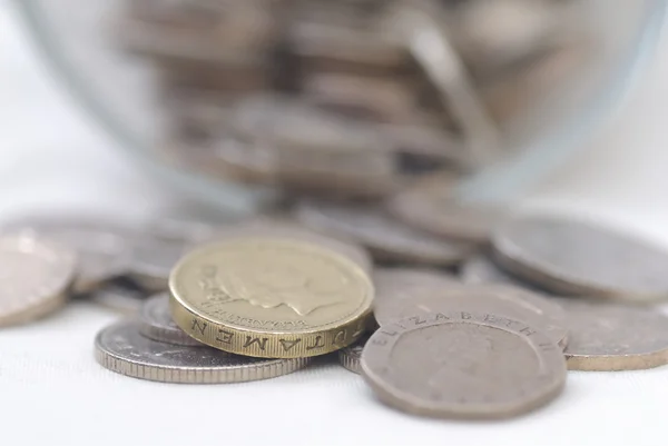 Gemorste munten uit glazen pot — Stockfoto