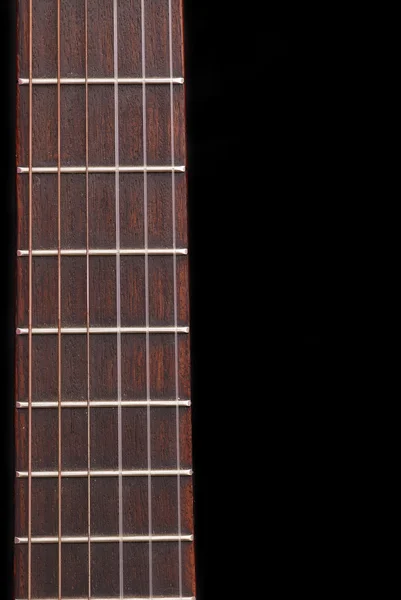Klasszikus gitár (spanyol) freboard, fekete háttér. Stock Kép