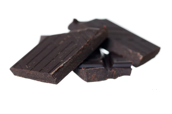 Pile of Dark Chocolate on White Background. — Stock Photo, Image