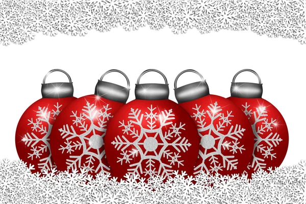 Fem röda ornament sitter på snöflingor — Stockfoto