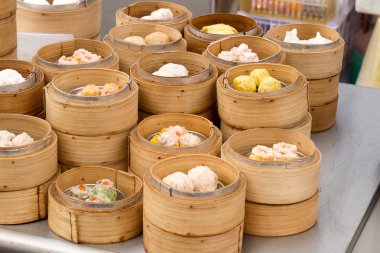 Steamed Dim Sum in Bamboo Trays clipart