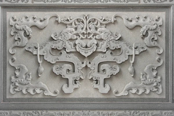 Çin yarasa symbol duvar taş oyma — Stok fotoğraf