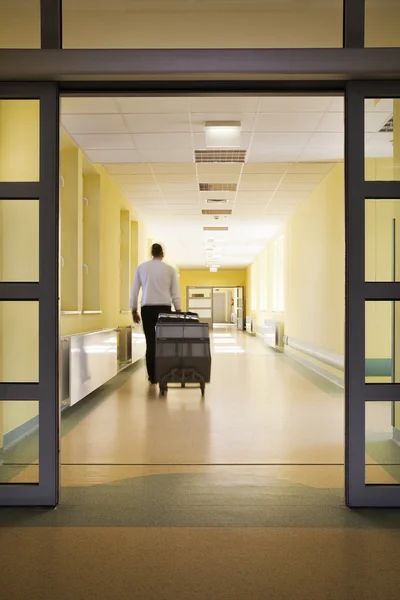 Man entering a hospital — Stock Photo, Image