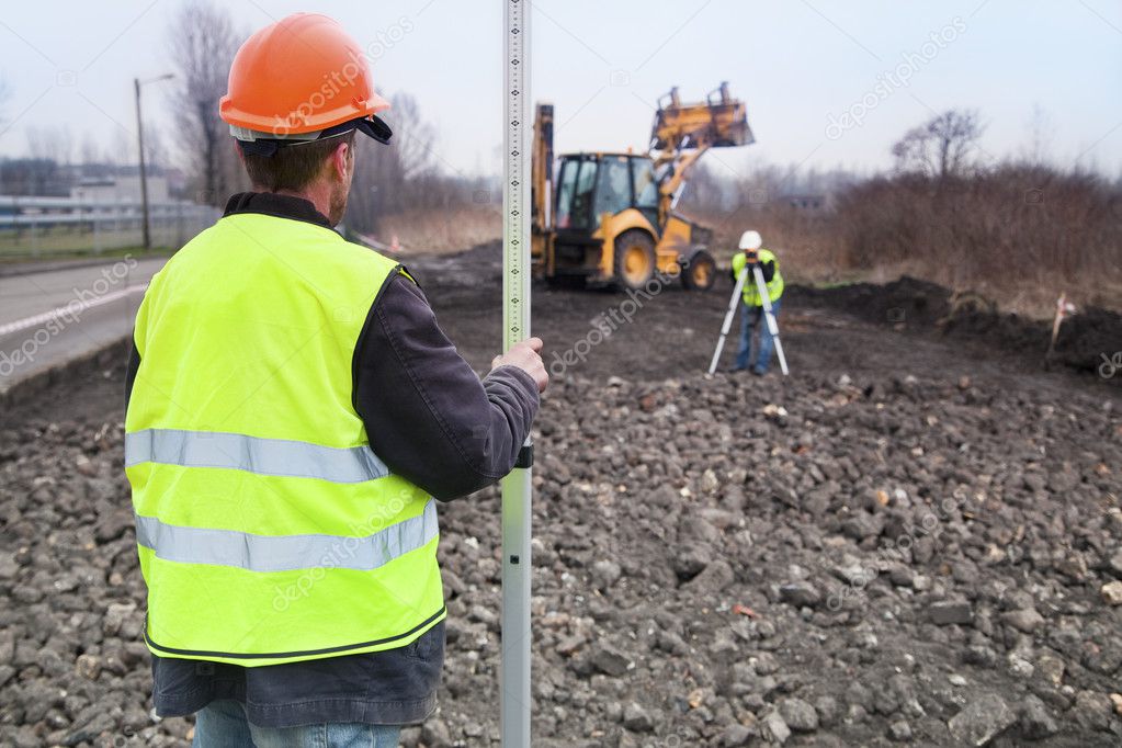 Building a road - Surveyors at work