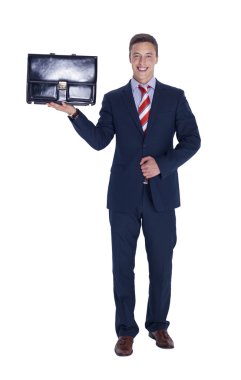 Smiling businessman with a briefcase clipart