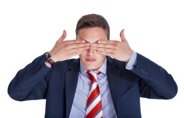 Businessman with eyes closed clipart