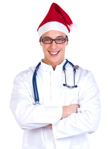 Smiling doctor in red christmas hat — Stock Photo, Image