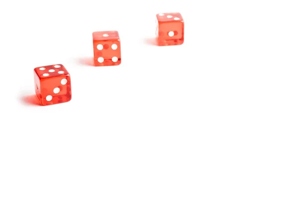Three red dice in a corner on white background — Stock Photo, Image