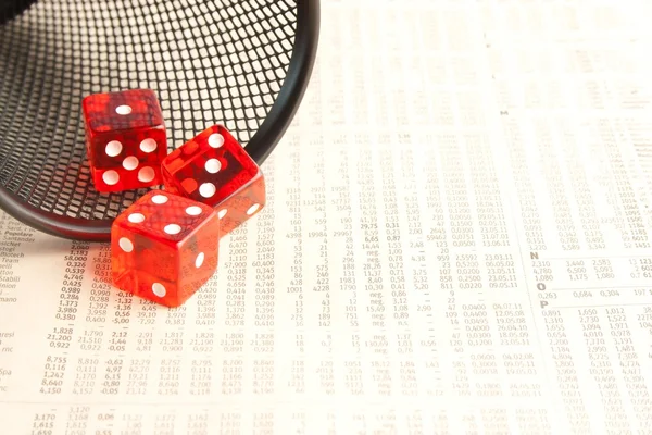Red dice on the financial newspaper — Stock Photo, Image