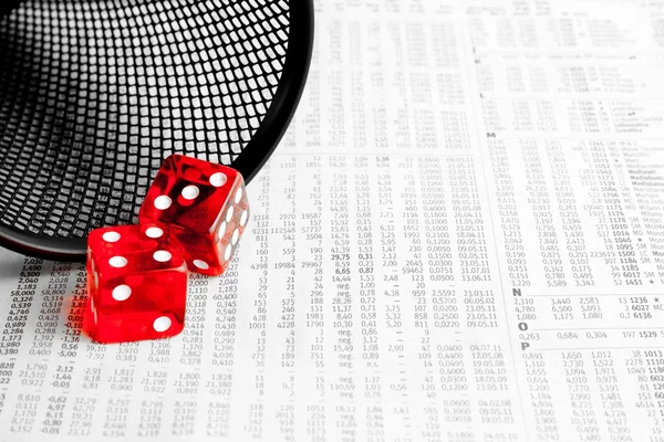 Red dice on the financial newspaper — Stock Photo, Image