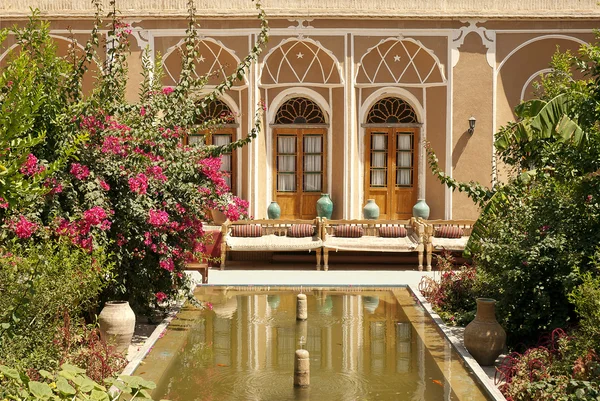 stock image Hotel interior garden with pond in yazd iran