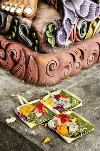 Offerings in temple bali indonesia Stock Photo