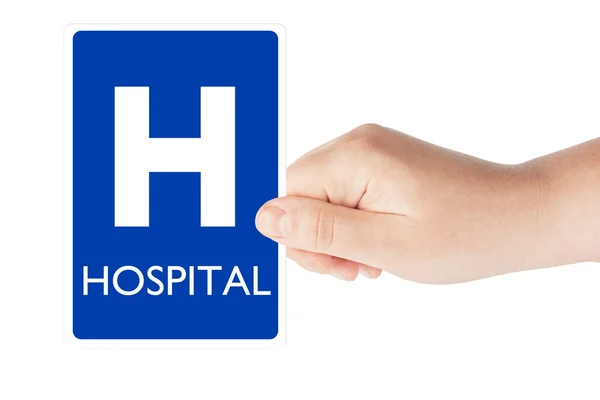 Hospital traffic sign in the hand — Stock Photo, Image