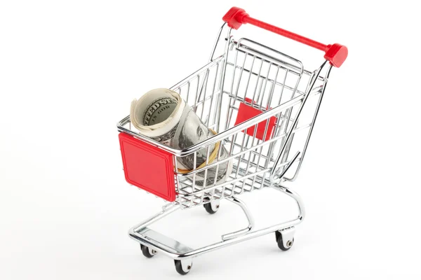 Shopping cart and dollars — Stock Photo, Image