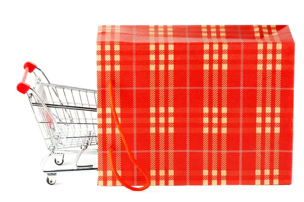 Shopping cart och papper påse — Stockfoto