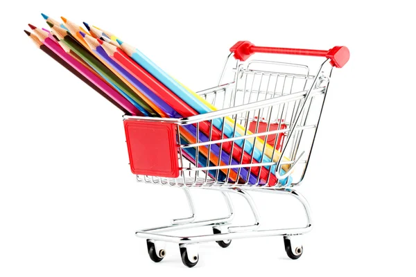 Carrinho de compras com muitos lápis — Fotografia de Stock
