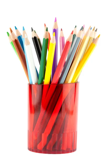 Muitos lápis em copo vermelho — Fotografia de Stock