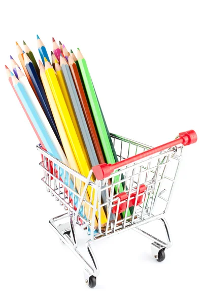 Shopping cart with many pencils Royalty Free Stock Images