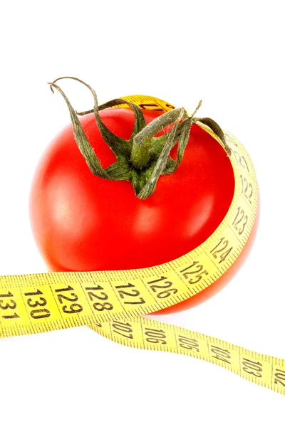 Pomidory z taśma miernicza — Zdjęcie stockowe