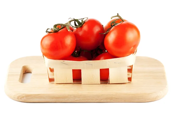 Tomatoes in the basket — Stock Photo, Image