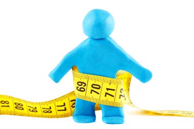 Plasticine man with measuring tape clipart