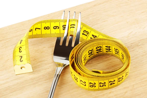 Fourchette avec ruban à mesurer — Photo