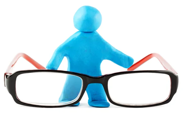 Plasticine man with eyeglass — Stock Photo, Image