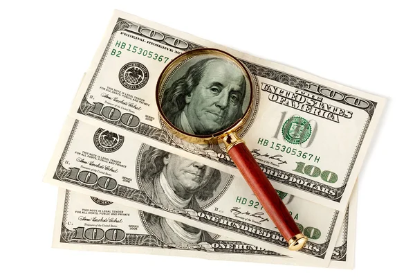 Hundred dollar bill under a magnifying glass — Stock Photo, Image