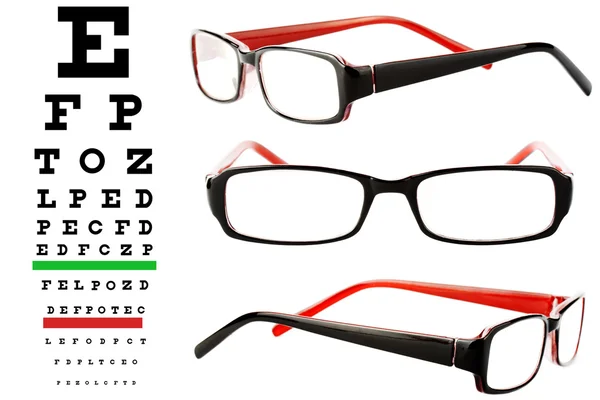 Reading glasses with eye chart — Stock Photo, Image