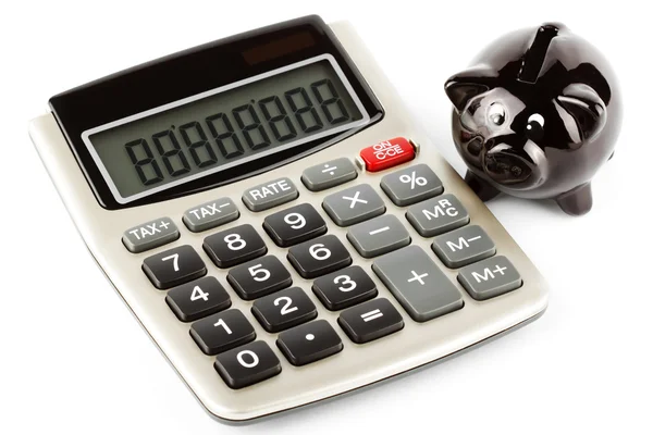 Calculator and piggy bank — Stock Photo, Image