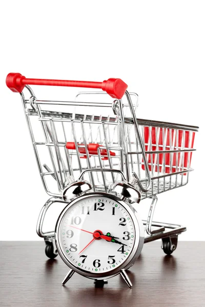 Coș de cumpărături și ceas deșteptător — Fotografie, imagine de stoc