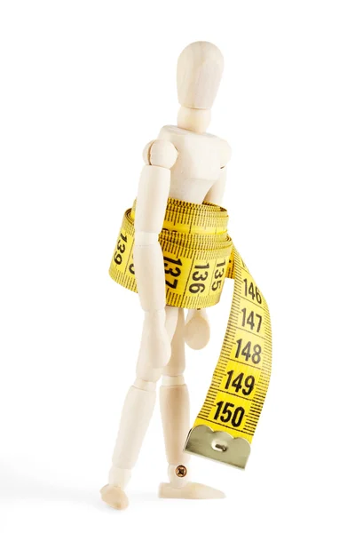 Dummy with measuring tape — Stock Photo, Image