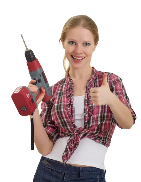 Young cheerful woman with rechargeable drill shows thumb up — Stock Photo, Image