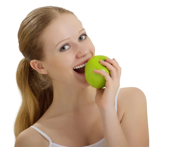 Ελκυστική υγιές κοριτσάκι που δαγκώνει ένα μήλο που απομονώνονται — Φωτογραφία Αρχείου