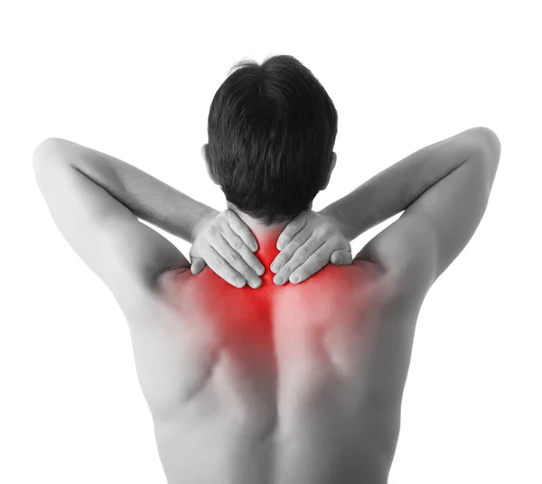 Rückansicht eines jungen Mannes mit schmerzverzerrtem Nacken, isoliert auf dem Rücken — Stockfoto