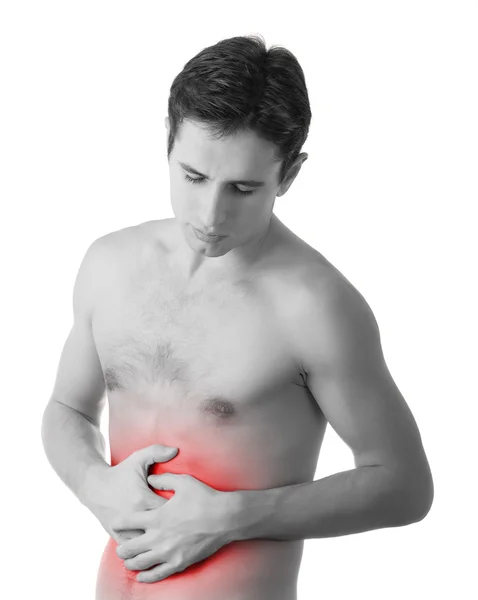 Молодой человек держит свой больной желудок в боли, изолированный на белом ba — стоковое фото