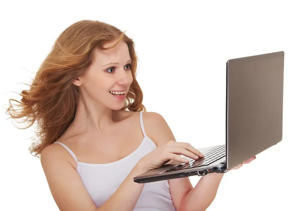 Linda menina feliz cabelo segurando um laptop isolado — Fotografia de Stock