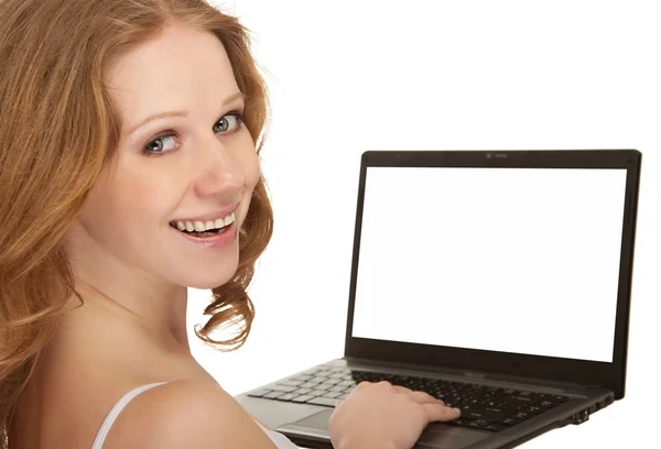 Hermosa chica feliz con un ordenador portátil con pantalla en blanco aislado — Foto de Stock
