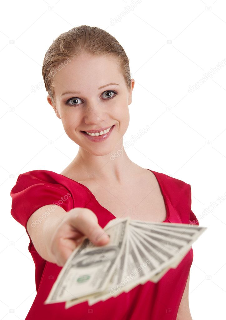 Beautiful cheerful girl in a red blouse holds out a wad of money