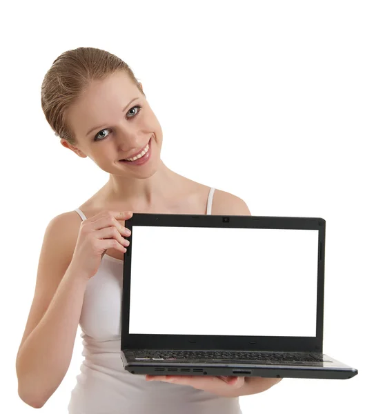 Dívka ukazuje notebook s prázdný prostor na obrazovce, izolované — Stock fotografie