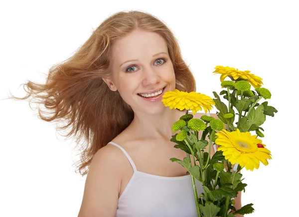 Beautiful smiling girl with flowing hair holding a bouquet of ye — Stock Photo, Image