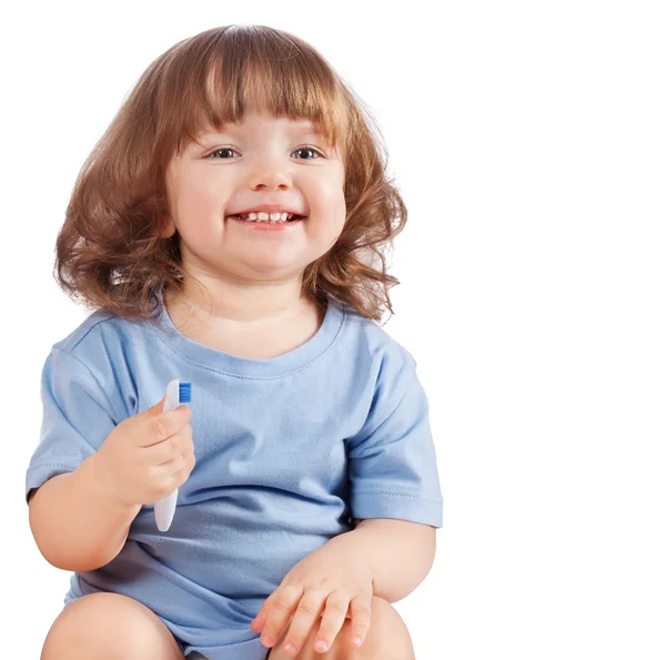 Kleines Mädchen putzt sich isoliert die Zähne — Stockfoto