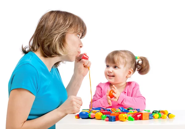 Mom plays with her daughter — Stock Photo, Image