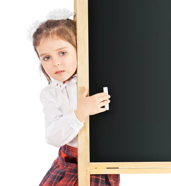 Schönes Mädchen an der Tafel, isoliert — Stockfoto