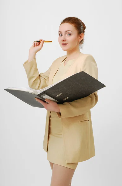 Surprised businesswoman with open folder — Stock Photo, Image