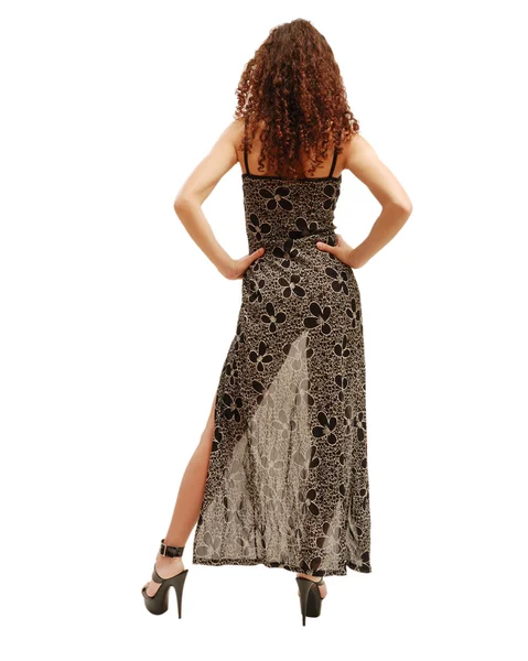 Slanke vrouw door de transparante jurk. — Stockfoto