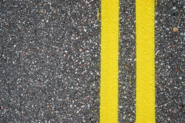 Close-up of road surfacing with lane lines — Stock Photo, Image