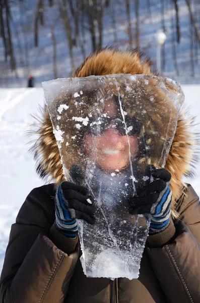 Stock image Woman with piece of ice.